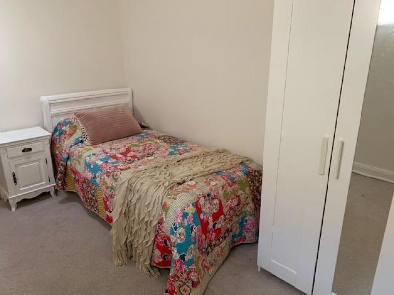 Large spacious rooms with bed, wardrobes, chair, lamp and some with airconditioning