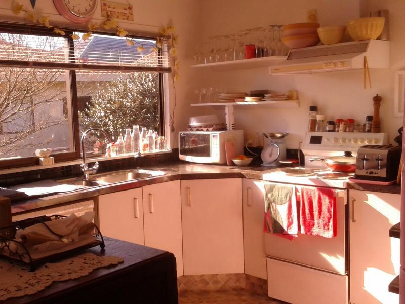 kitchen sunny..microwave fridge etc